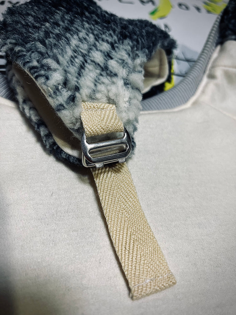 "Breeding for whom?" JACKET&CAP-NAVY